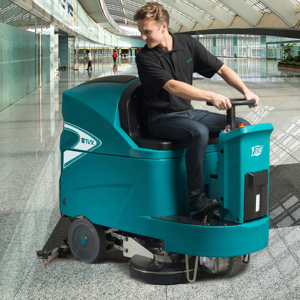 TVX T150-85R ride on scrubber dryer cleaning shopping centre floor.